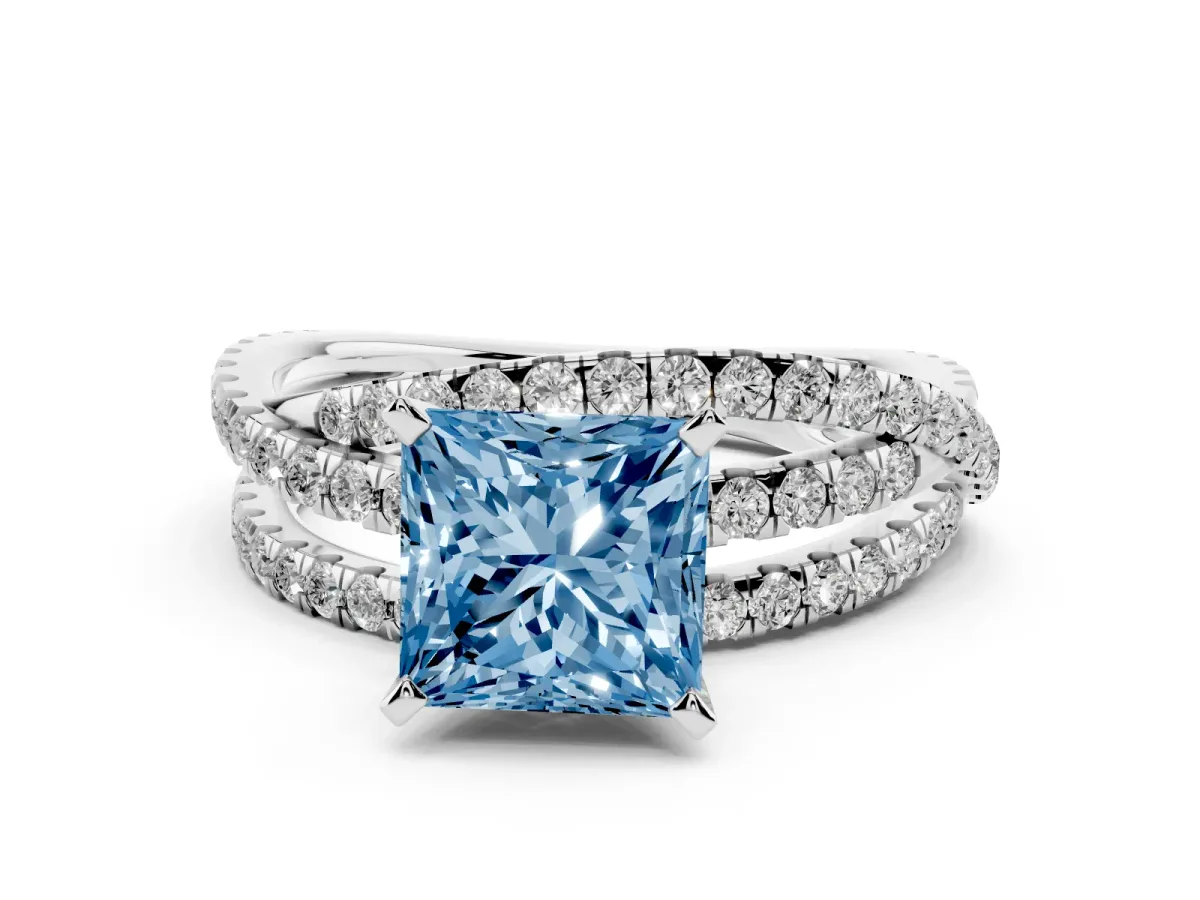 Fancy Blue Princess Cut Solitaire Twist Band with Pavé Setting and Four-Prong Setting Silver