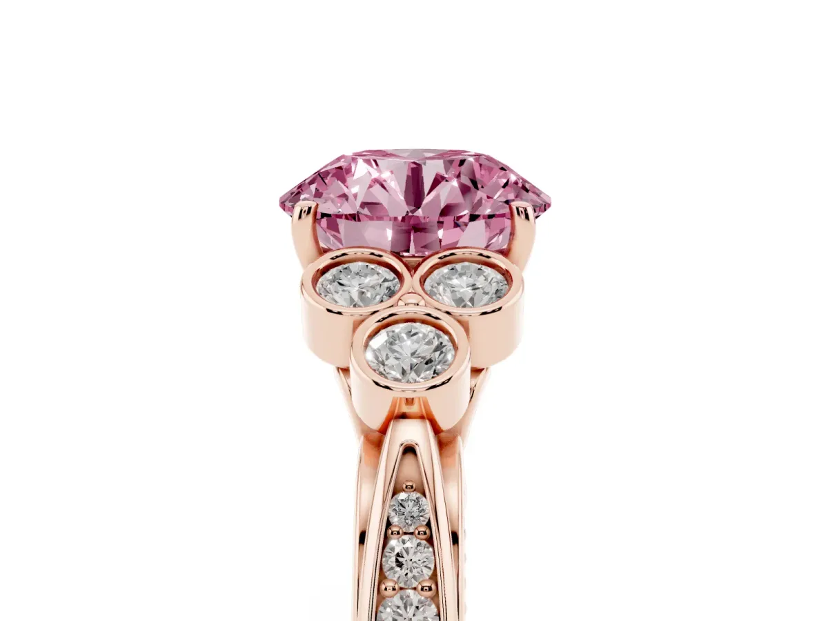 Fancy Pink Round Cut Cut Diamond Engagement Ring with Bezel Set Round Side Stones and Prong Setting Rose gold