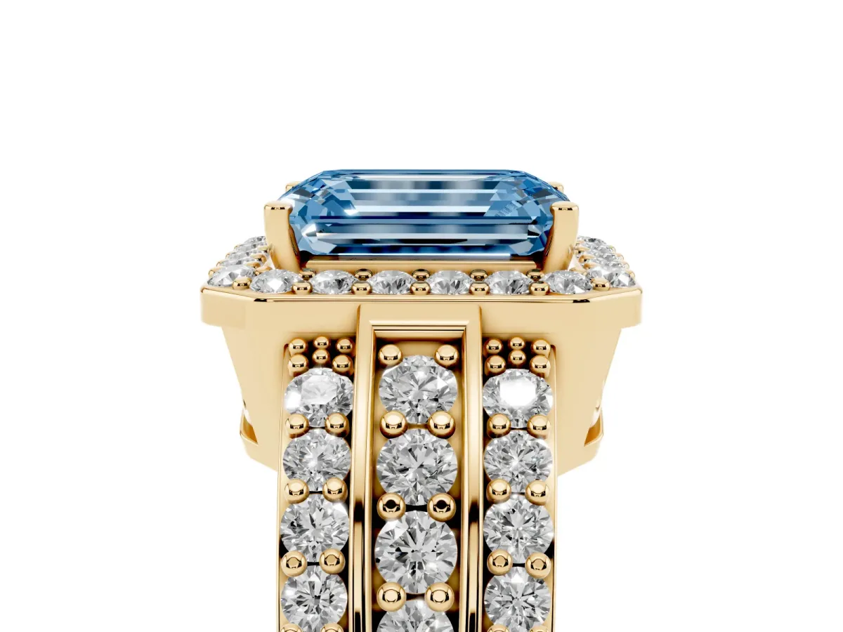 Fancy Blue Emerald Cut Halo Diamond Ring with Round Split Shank and Prong Setting Yellow gold