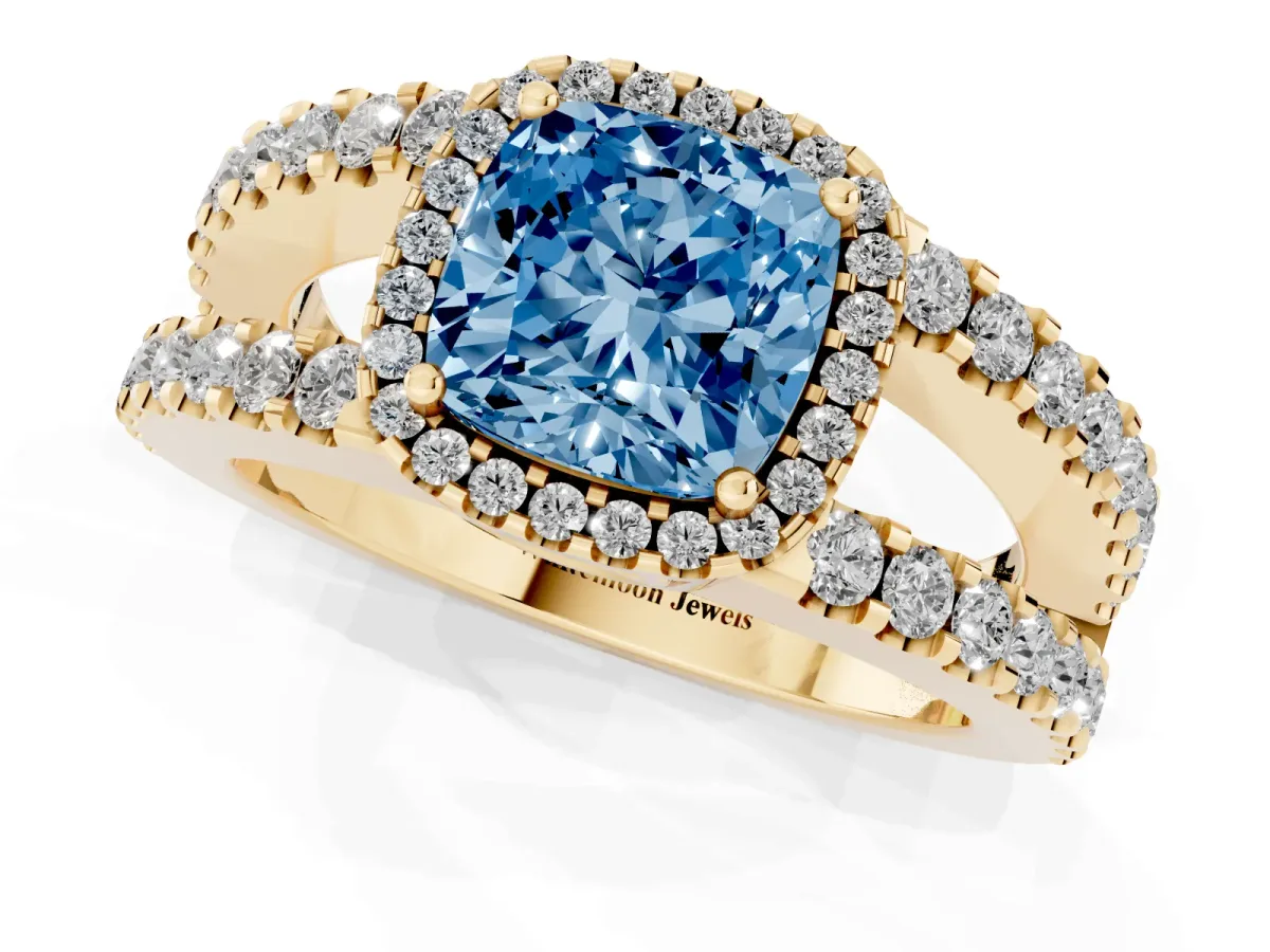 Fancy Blue Cushion Cut Cut Halo Split Shank Diamond Ring with Four-Prong Setting Yellow gold