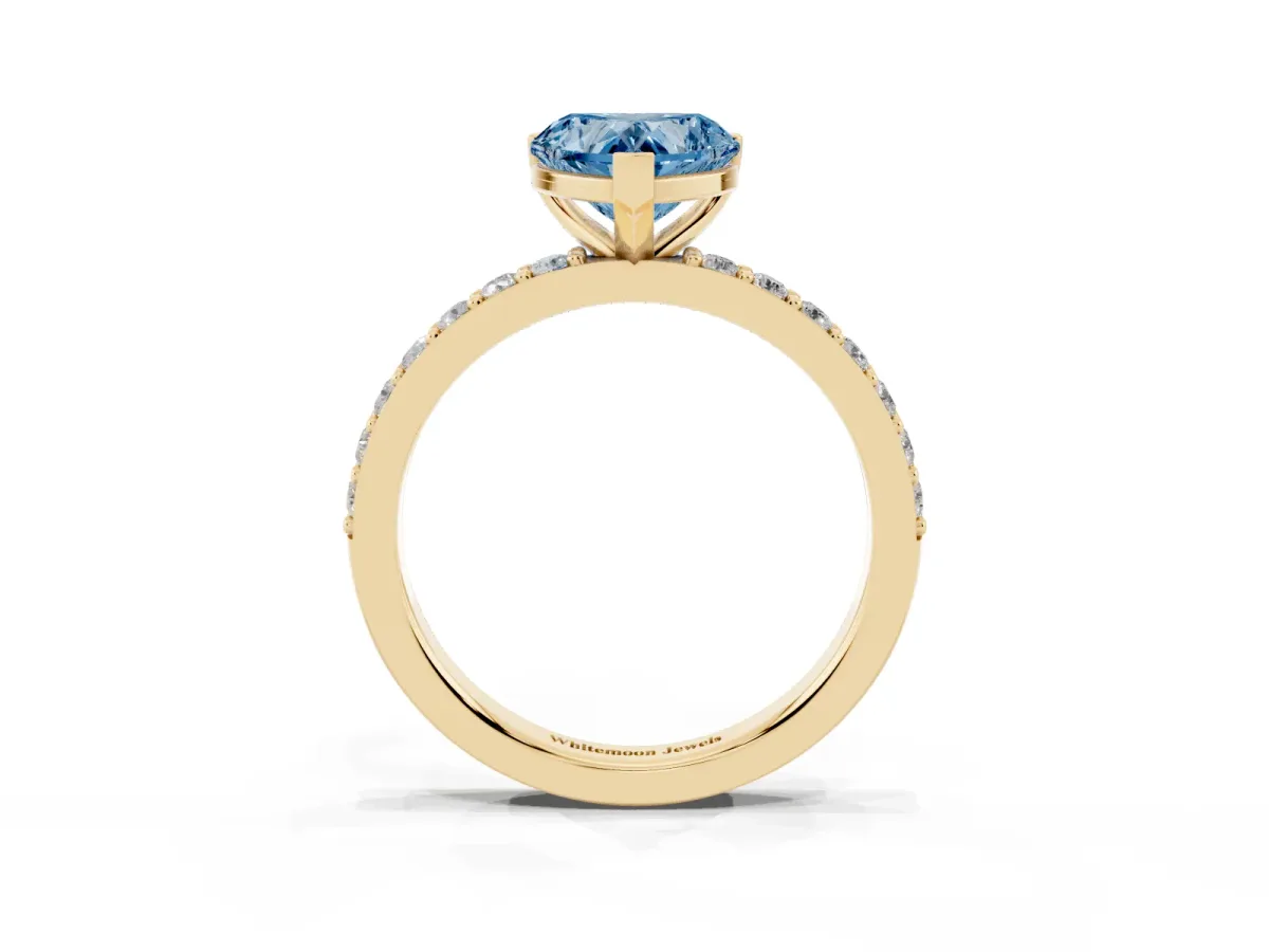 Fancy Blue Heart Cut Cut Diamond Solitaire with Pave Band and Four-Prong Setting Yellow gold