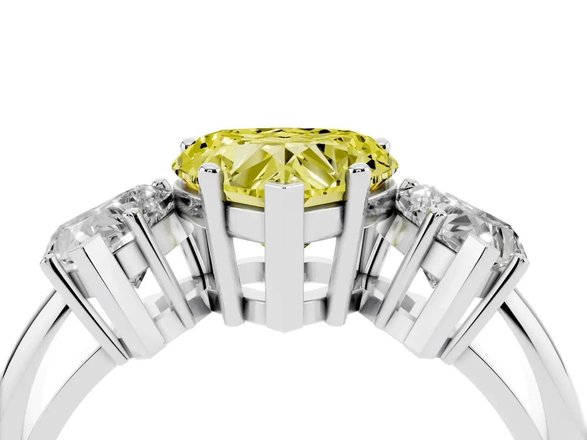 Fancy Yellow Three-Stone Heart Cut Cut Diamond Engagement Ring with Prong Setting on a White Gold Band Silver