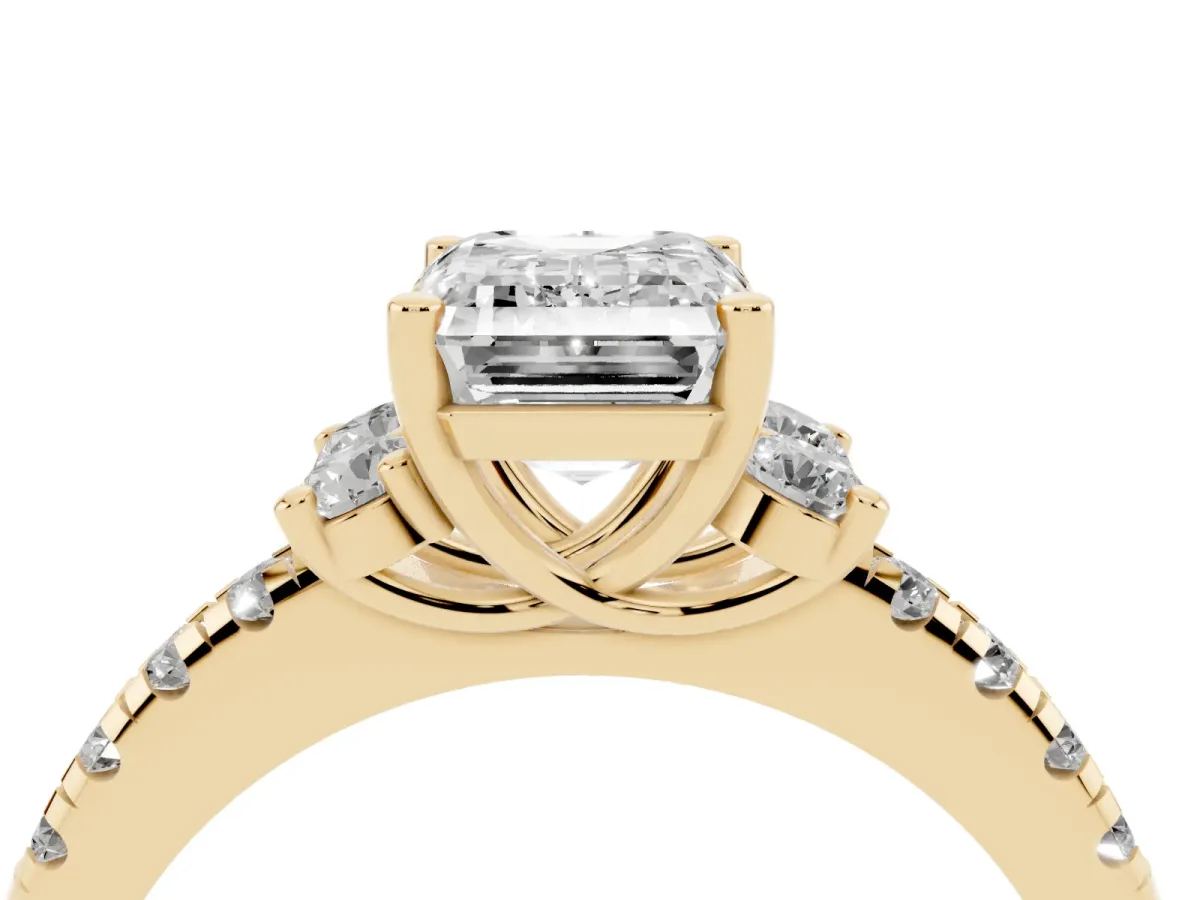 Emerald Cut Diamond Three-Stone Pave Band with Four-Prong Setting Yellow gold