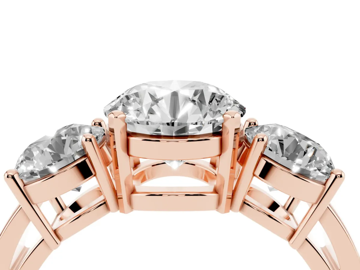 Three-Stone Round Cut Diamond Ring with Round Side Stones, Classic Band, and Four-Prong Setting Rose gold