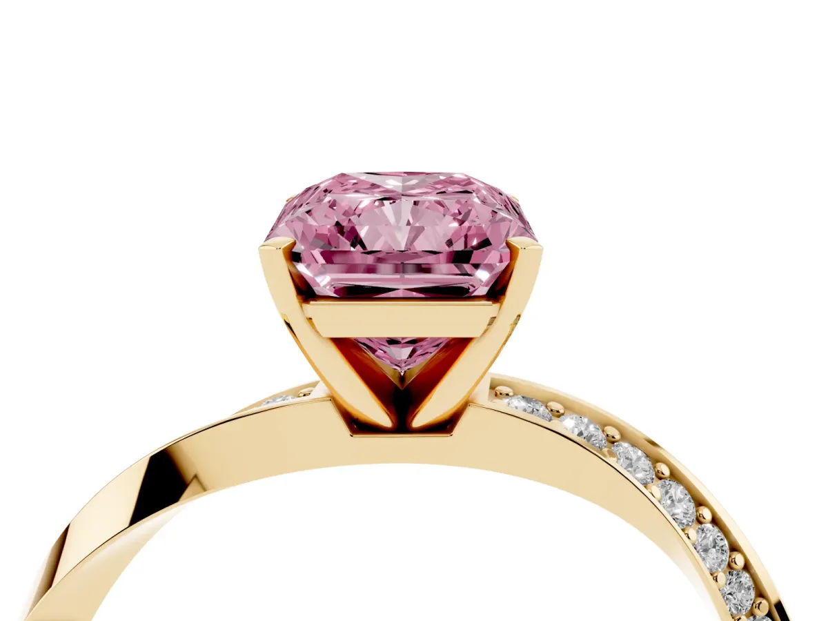 Fancy Pink Radiant Cut Diamond Engagement Ring with Side Stone Accents and Four-Prong Setting Yellow gold
