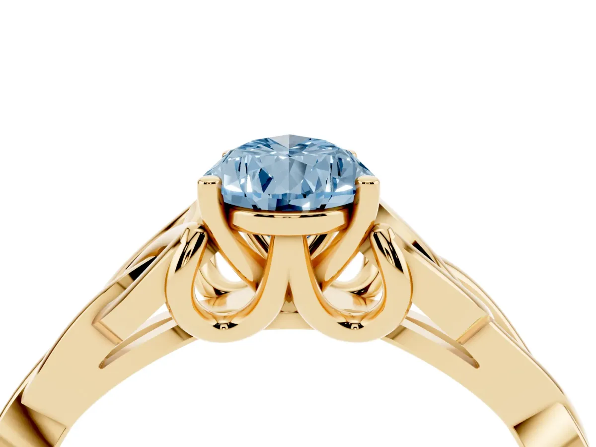 Fancy Blue Pear Cut Diamond Solitaire Engagement Ring with Celtic Knot Band and Four-Prong Setting Yellow gold