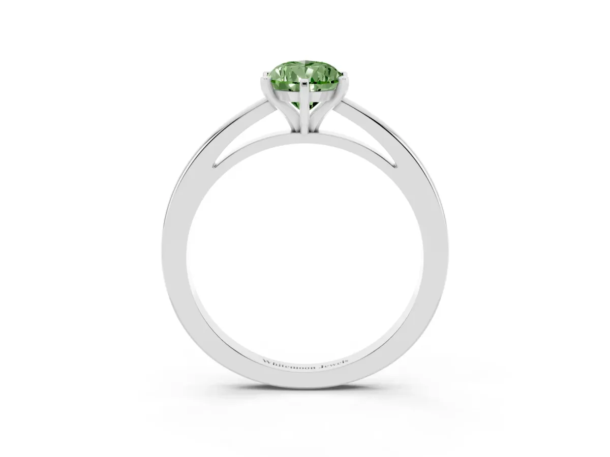 Fancy Green Pear Cut Solitaire Diamond Engagement Ring with Four-Prong Setting on a Classic Band Silver