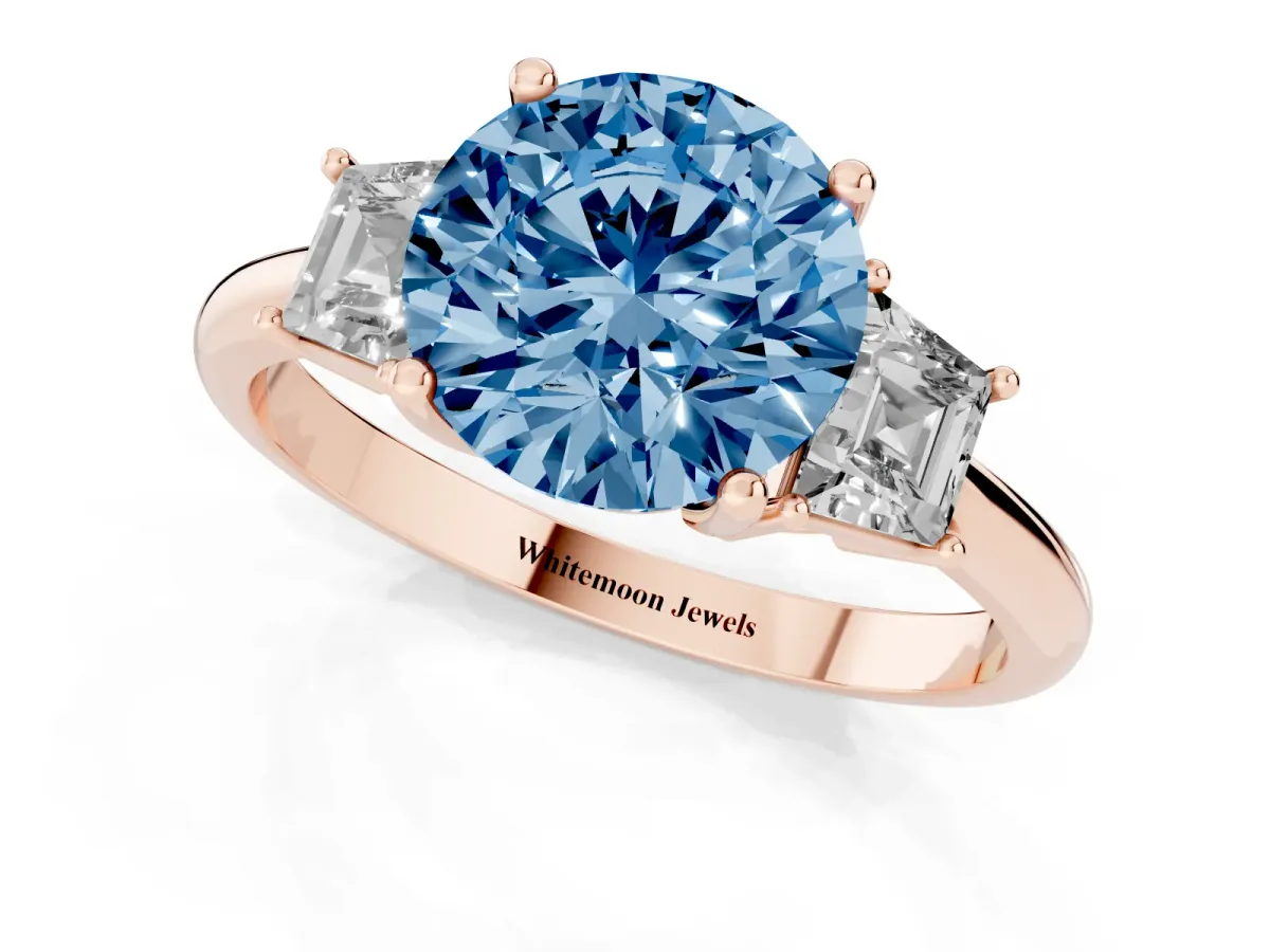 Fancy Blue Round Cut Diamond Three-Stone Ring with Trapezoid Side Stones and Prong Setting Rose gold
