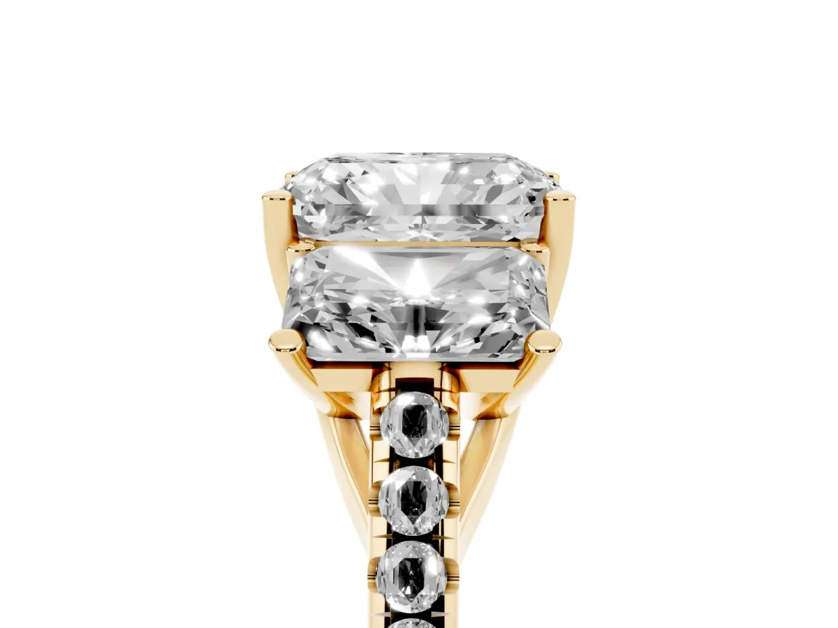 Three-Stone Radiant Cut Diamond Ring with Round Pavé Band and Prong Setting Yellow gold