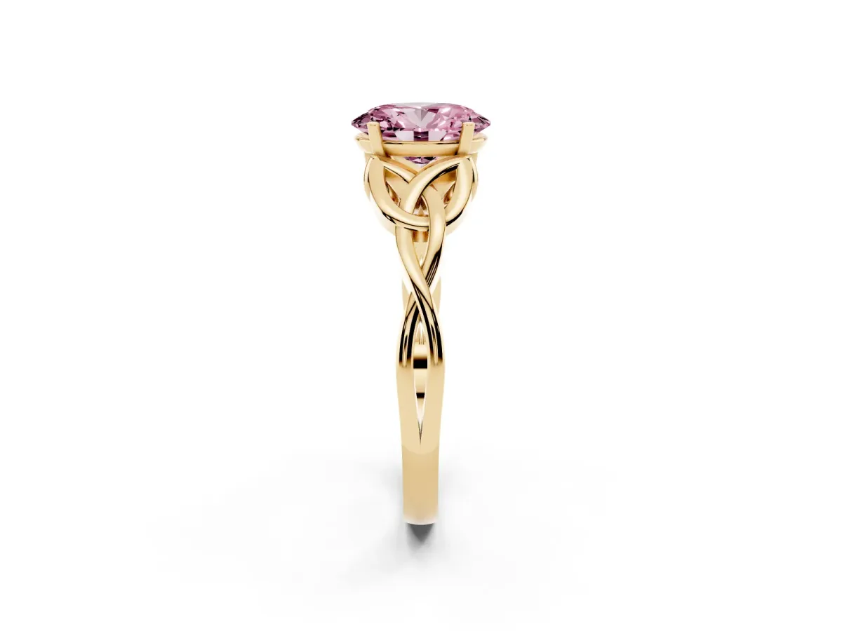 Fancy Pink Oval Cut Diamond Solitaire Engagement Ring with Celtic Knot Band and Four-Prong Setting Yellow gold