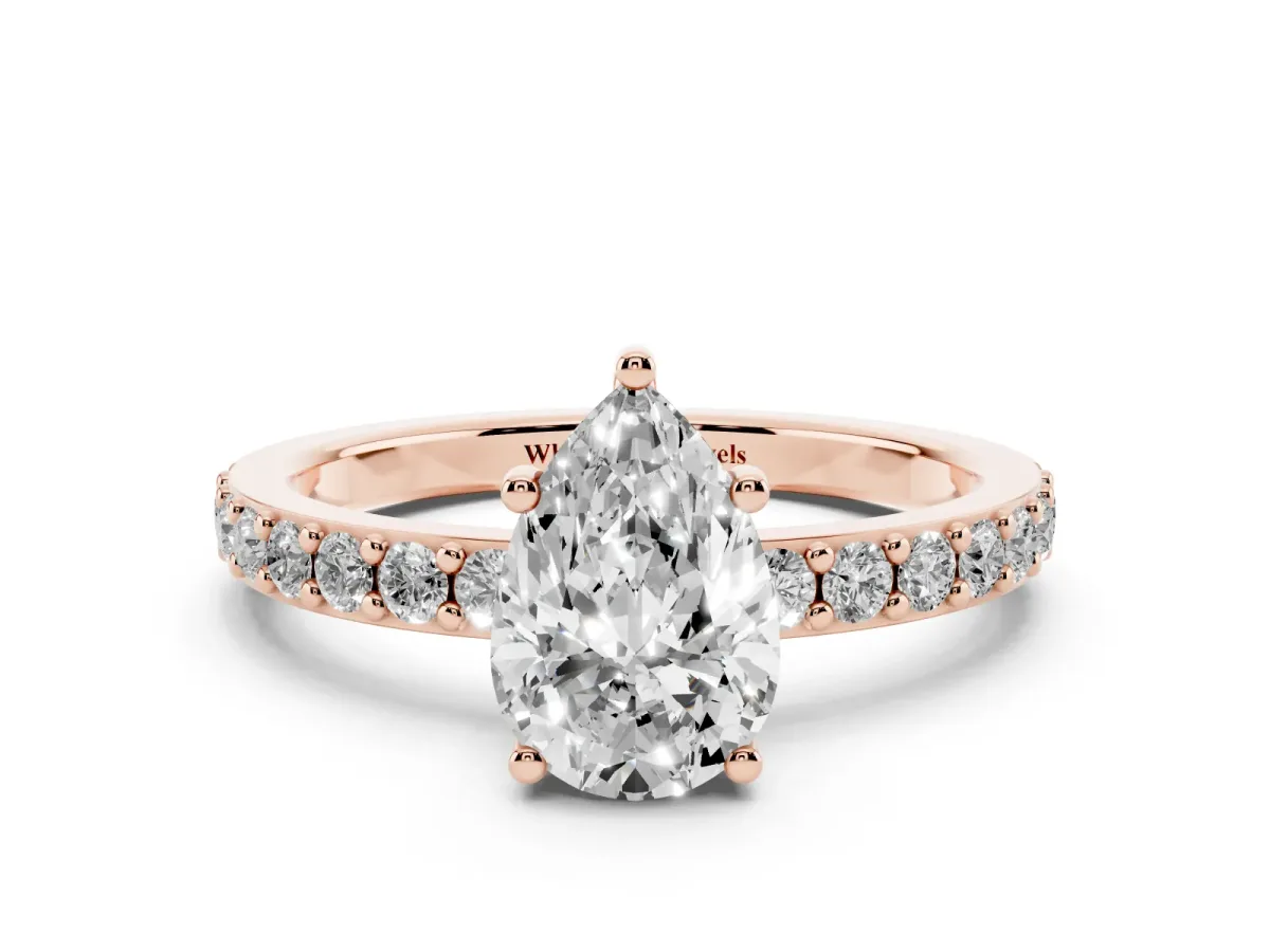 Pear Cut Cut Diamond Solitaire with Pave Band and Four-Prong Setting Rose gold