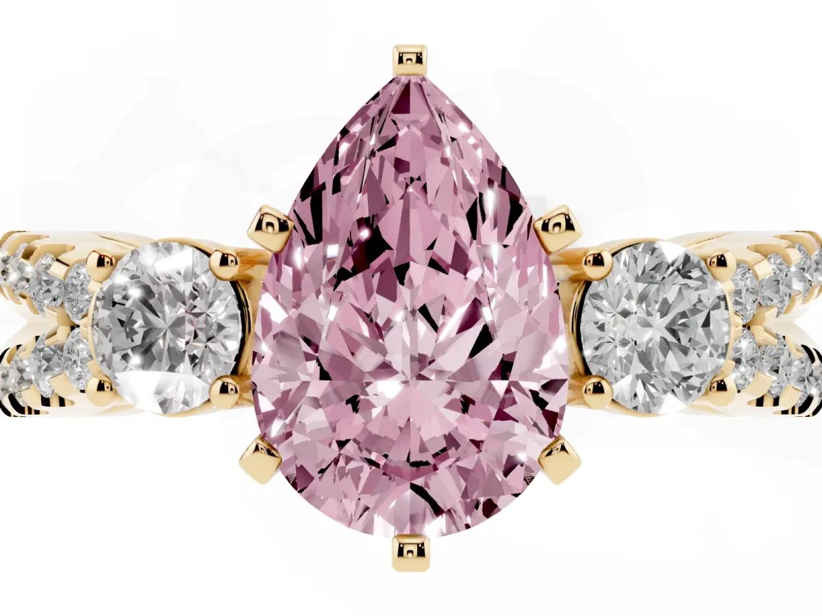 Fancy Pink Pear Cut Diamond Three-Stone Ring with Pavé Split Shank and Four-Prong Setting Yellow gold