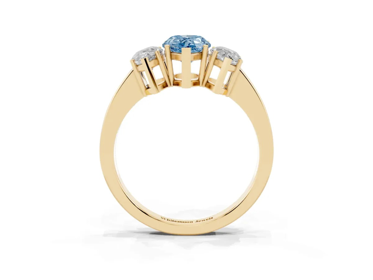 Fancy Blue Three-Stone Pear Cut Cut Diamond Engagement Ring with Flat Band and Four-Prong Setting Yellow gold