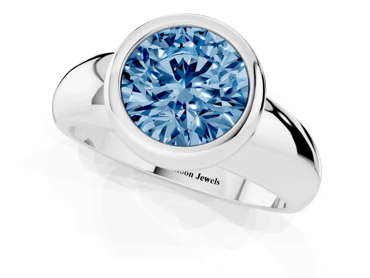 Fancy Blue Bezel Set Round Cut Solitaire Ring with Wide Band Platinum