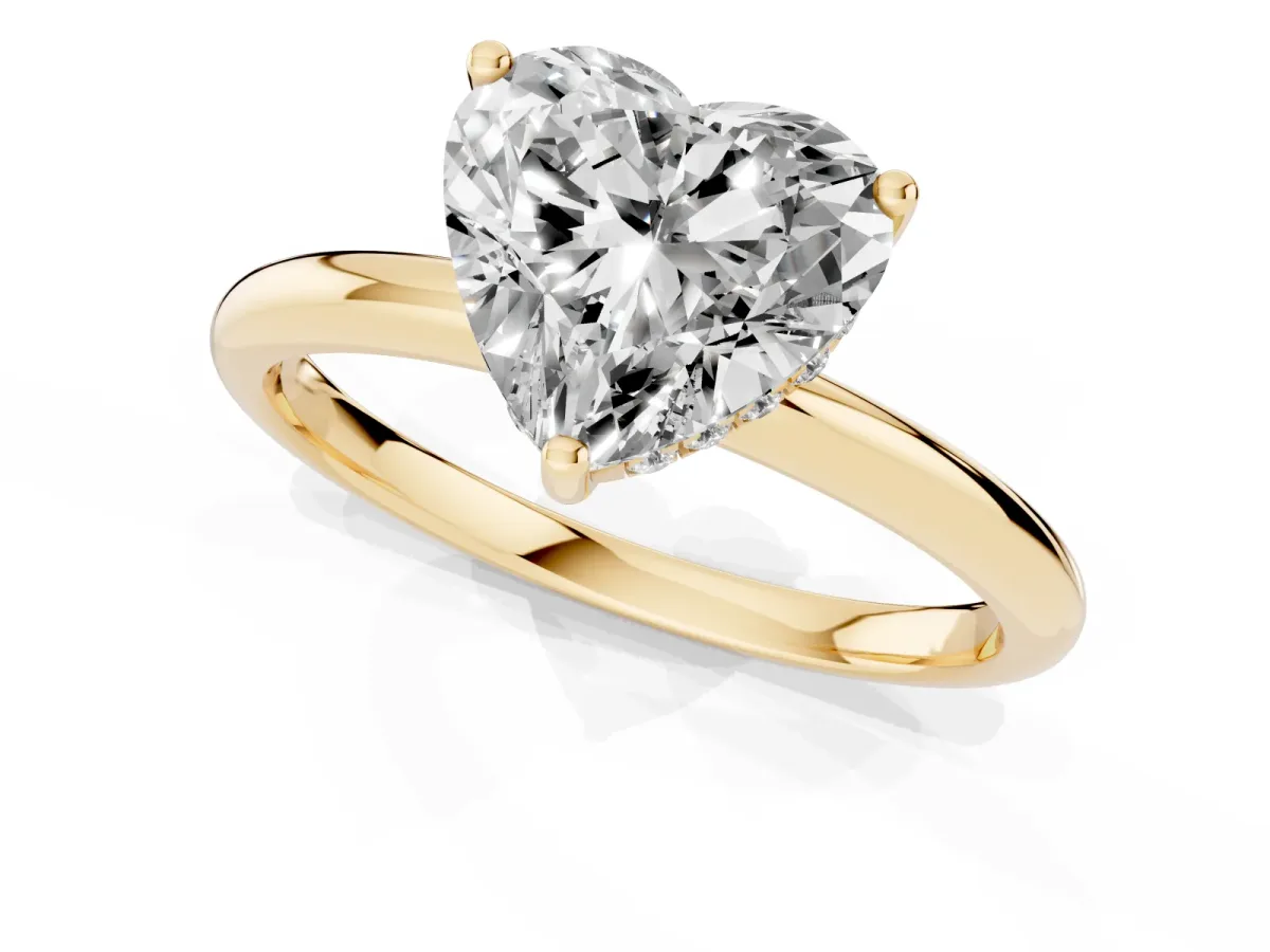 Heart Cut Cut Solitaire Engagement Ring with Four-Prong Setting and Classic Band Yellow gold