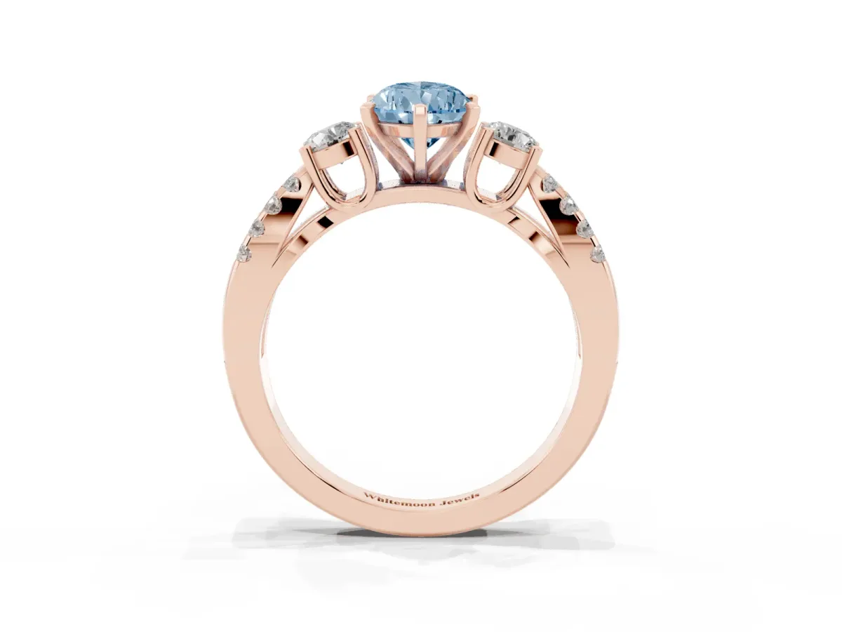 Fancy Blue Pear Cut Diamond Three-Stone Ring with Pavé Split Shank and Four-Prong Setting Rose gold