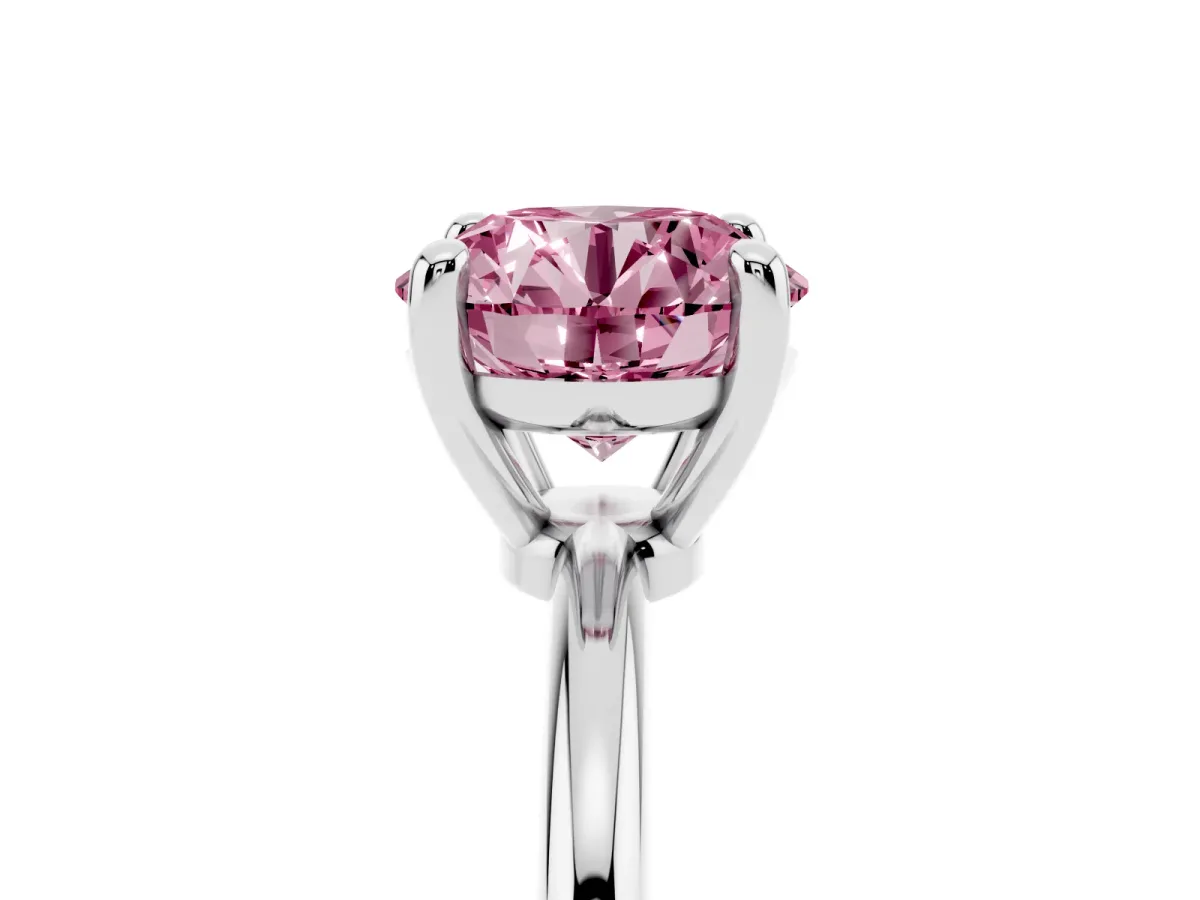 Fancy Pink Round Cut Solitaire Diamond Ring with 4-Prong Setting on a Classic Band Platinum