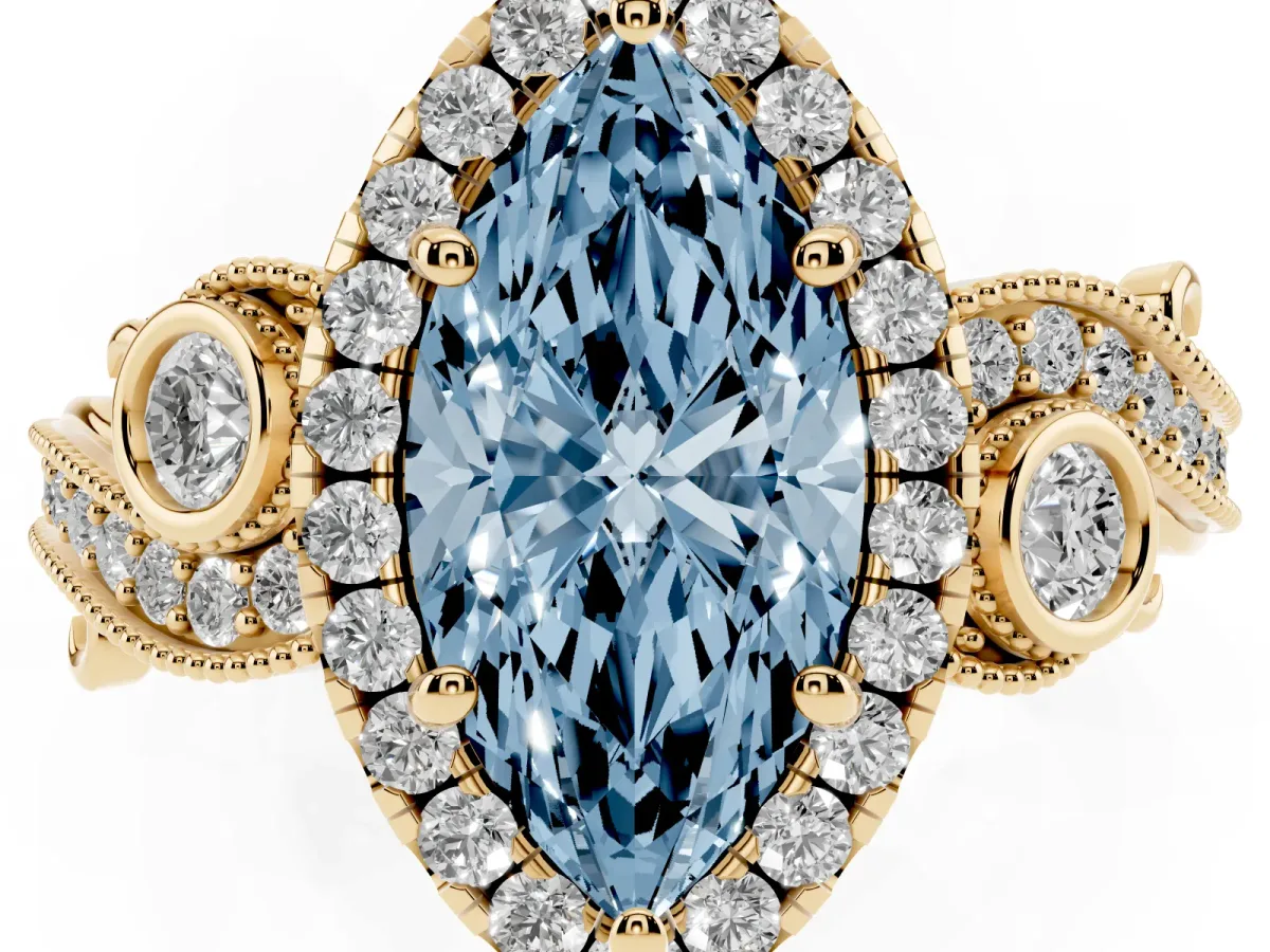 Fancy Blue Marquise Cut Halo Diamond Ring with Milgrain and Bezel Accents on a Split Shank Band Yellow gold