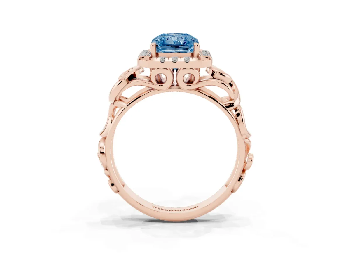 Fancy Blue Radiant Cut Cut Halo Diamond Ring with Scrollwork Band and Four-Prong Setting Rose gold