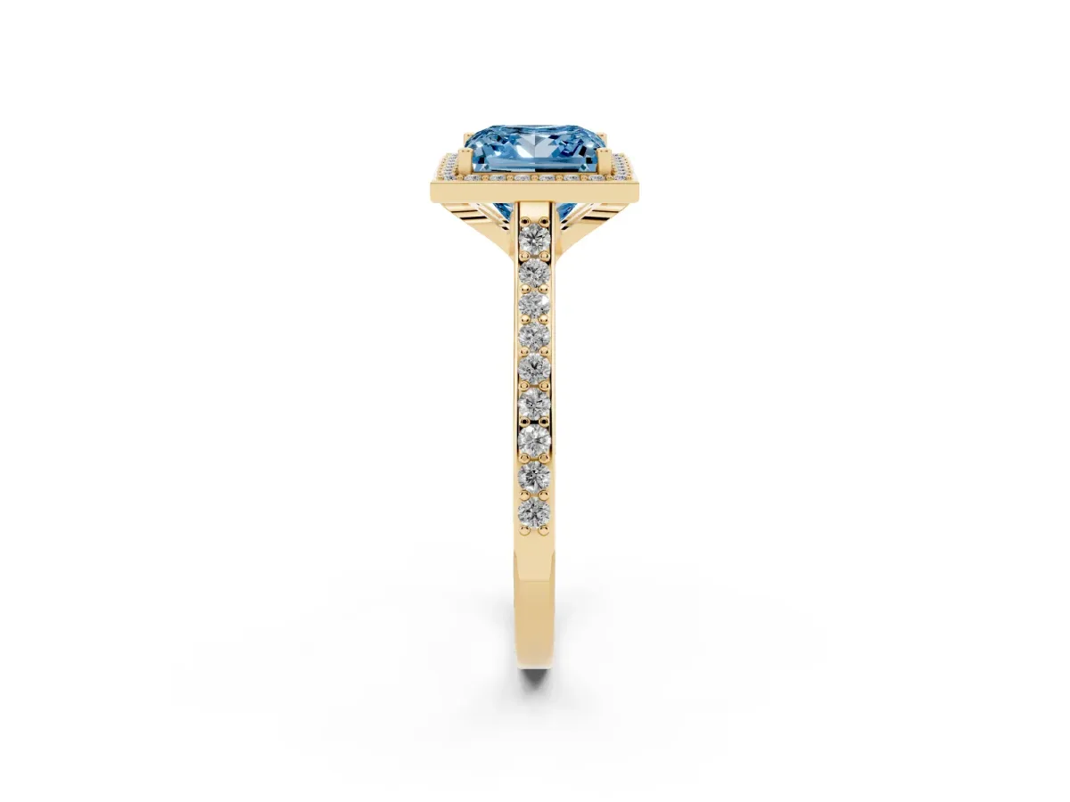 Fancy Blue Princess Cut Diamond Halo Engagement Ring with Round Pavé Shoulders and Prong Setting Yellow gold