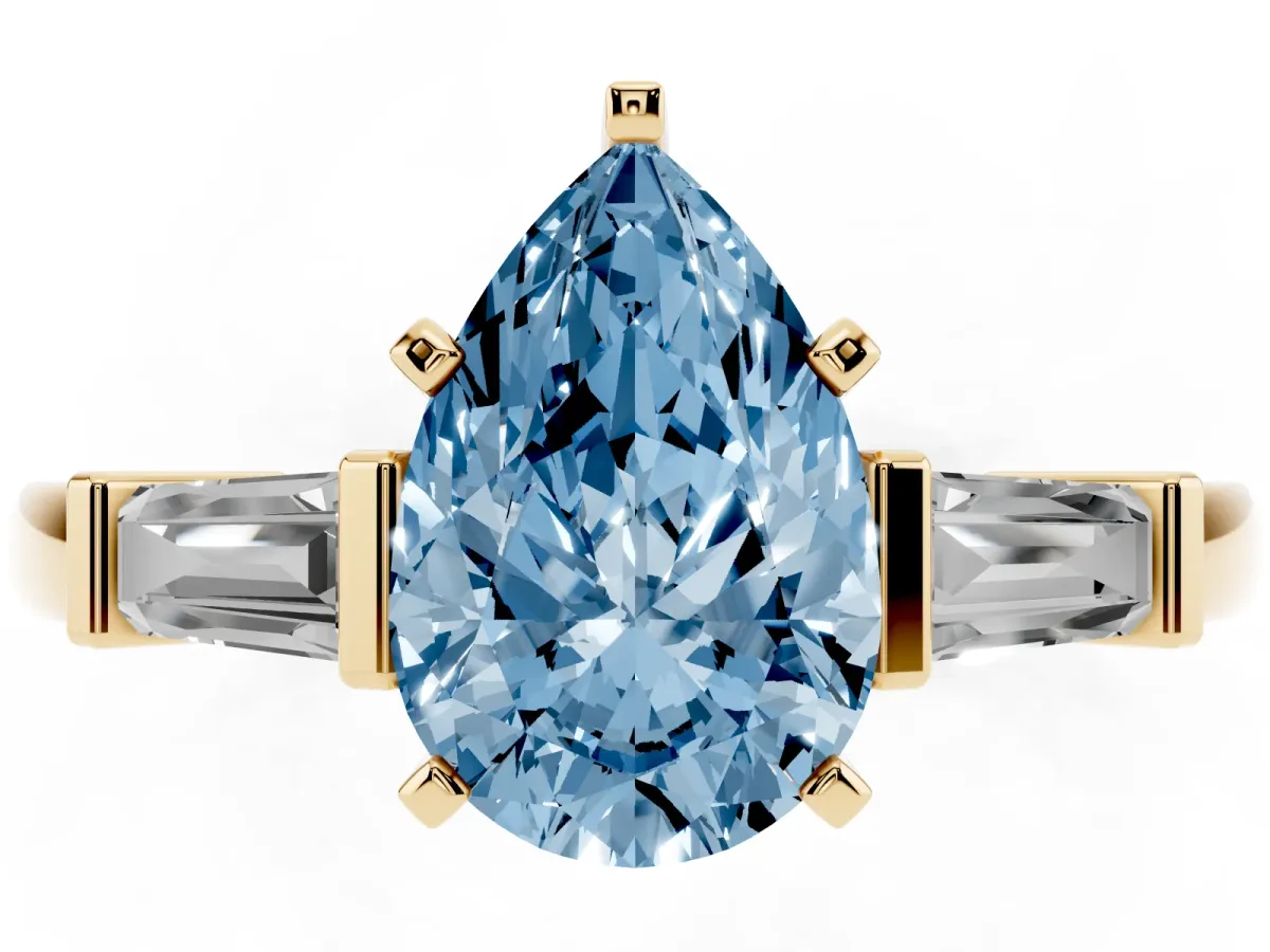 Fancy Blue Pear Cut Cut Diamond Solitaire Ring with Tapered Baguette Accents and Four-Prong Setting Yellow gold