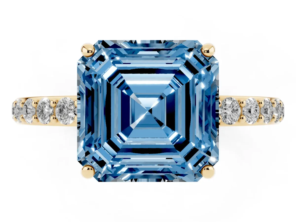 Fancy Blue Asscher Cut Diamond Solitaire Ring with Round Pavé Shoulders and Prong Setting Yellow gold