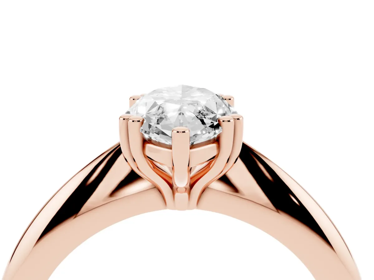 Marquise Cut Cut Solitaire Engagement Ring with Tapered Band and Four-Prong Setting Rose gold