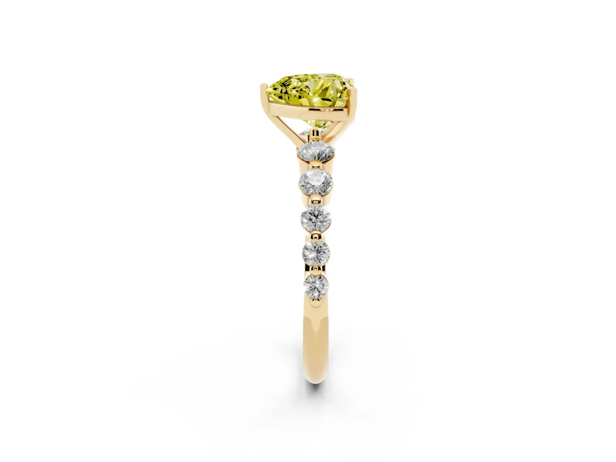 Fancy Yellow Heart Cut Solitaire Diamond Ring with Pave Band and Four-Prong Setting Yellow gold
