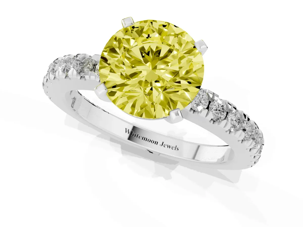 Fancy Yellow Round Cut Solitaire Diamond with Pavé Band and Four-Prong Setting Platinum