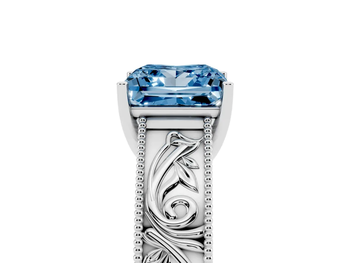 Fancy Blue Princess Cut Diamond Solitaire Ring with Engraved Band and Four-Prong Setting White gold