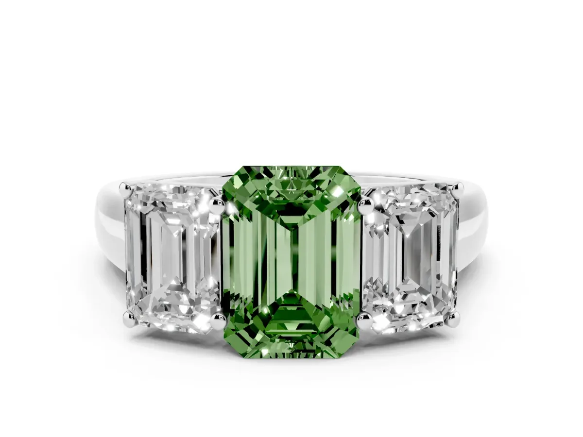 Fancy Green Emerald Cut Three-Stone Diamond Ring with Prong Setting on a Classic Band Silver
