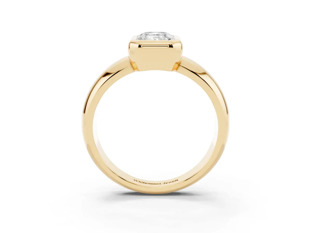Bezel Set Emerald Cut Solitaire Ring with Wide Band Yellow gold