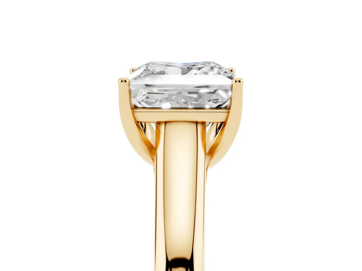 Princess Cut Solitaire Engagement Ring with Tapered Band and Four-Prong Setting Yellow gold