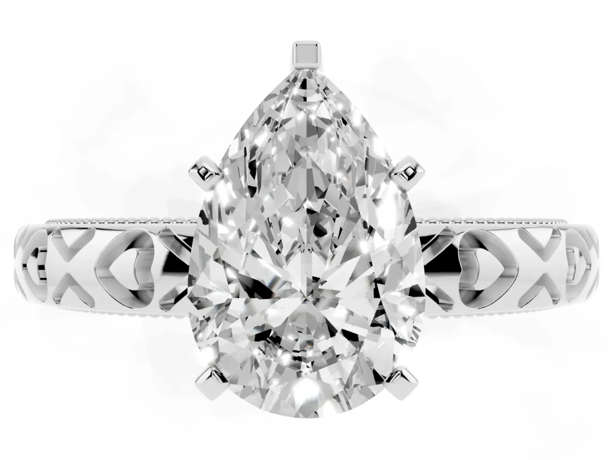 Pear Cut Solitaire Diamond Engagement Ring with XO Engraved Band and Four-Prong Setting White gold