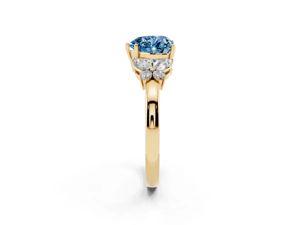Fancy Blue Heart Cut Cut Solitaire Floral Diamond Ring with Four-Prong Setting Yellow gold