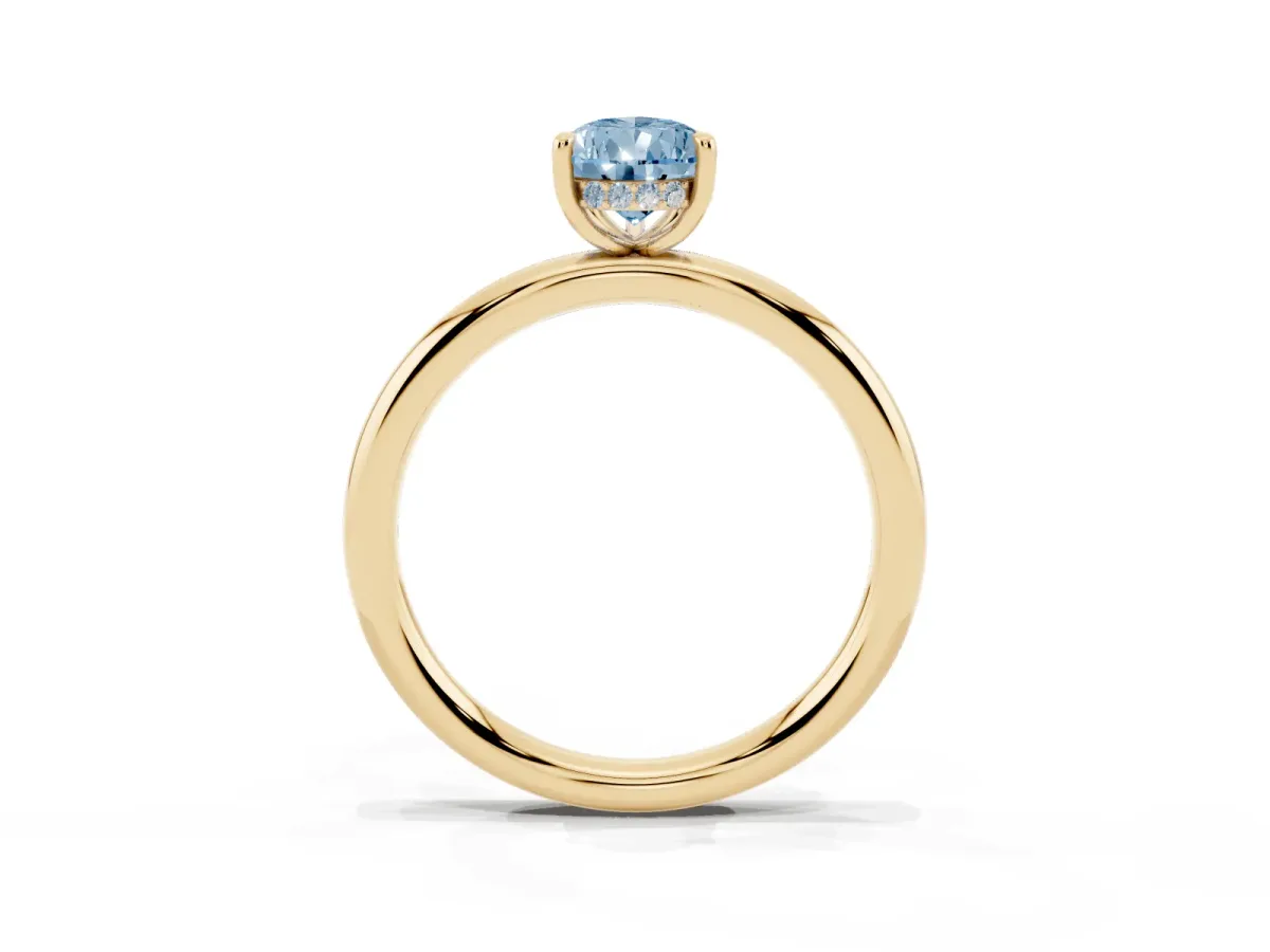 Fancy Blue Pear Cut Diamond Solitaire Ring with Thin Band and Four-Prong Setting Yellow gold