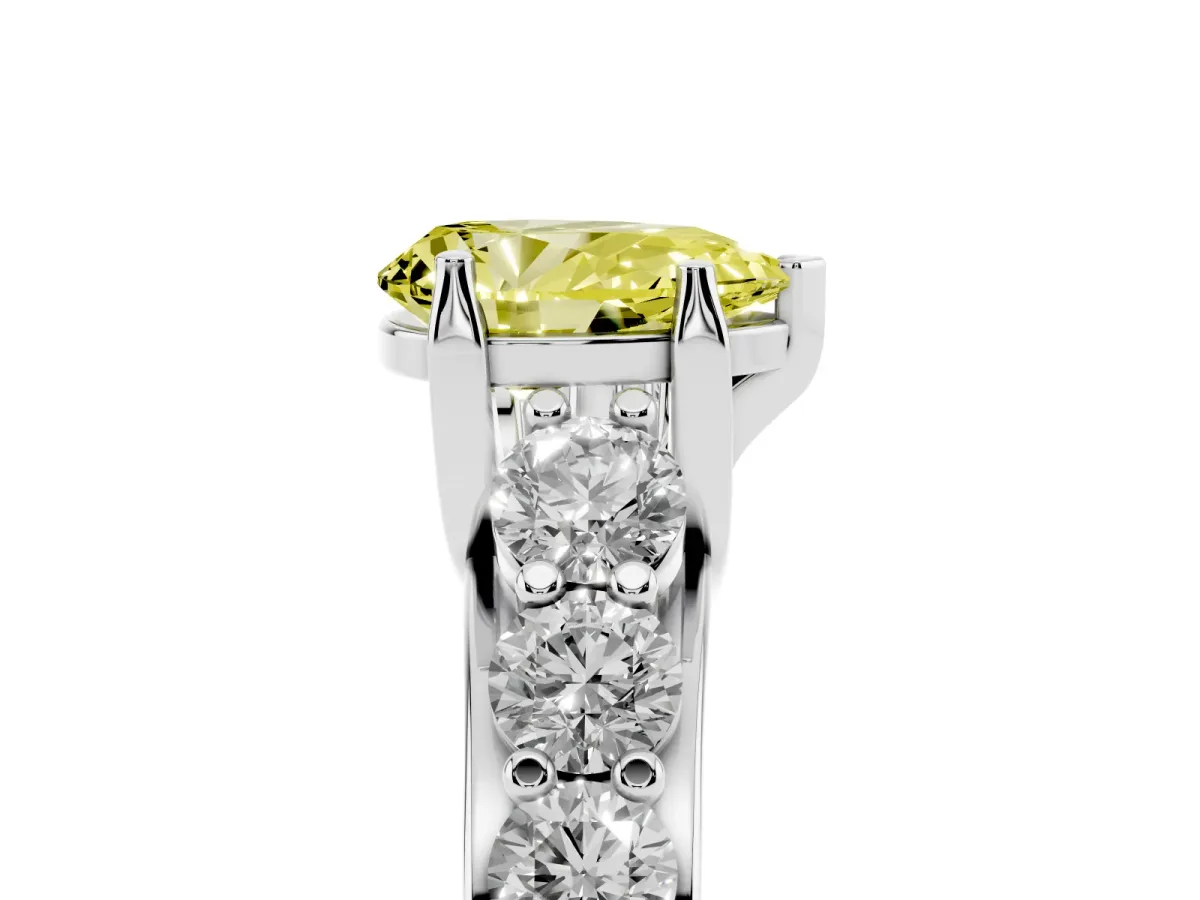 Fancy Yellow Pear Cut Diamond Engagement Ring with Pavé Band and Four-Prong Setting Silver