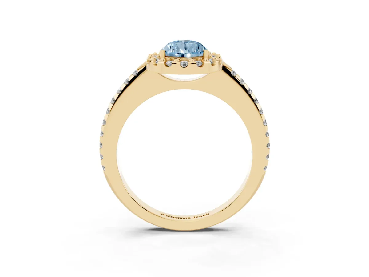 Fancy Blue Pear Cut Diamond Pavé Halo Ring with Four-Prong Setting Yellow gold