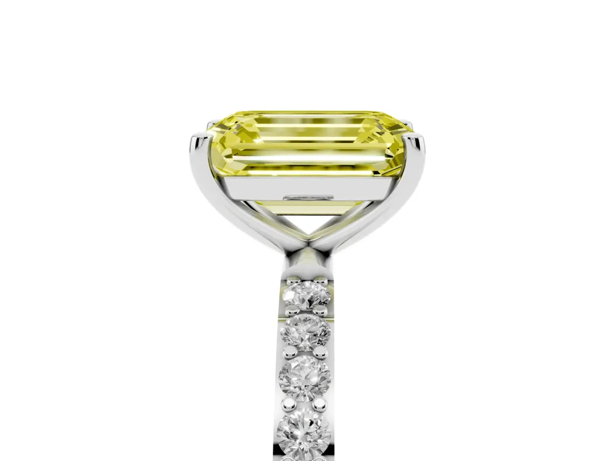 Fancy Yellow Emerald Cut Diamond Solitaire Ring with Round Pavé Shoulders and Prong Setting Platinum