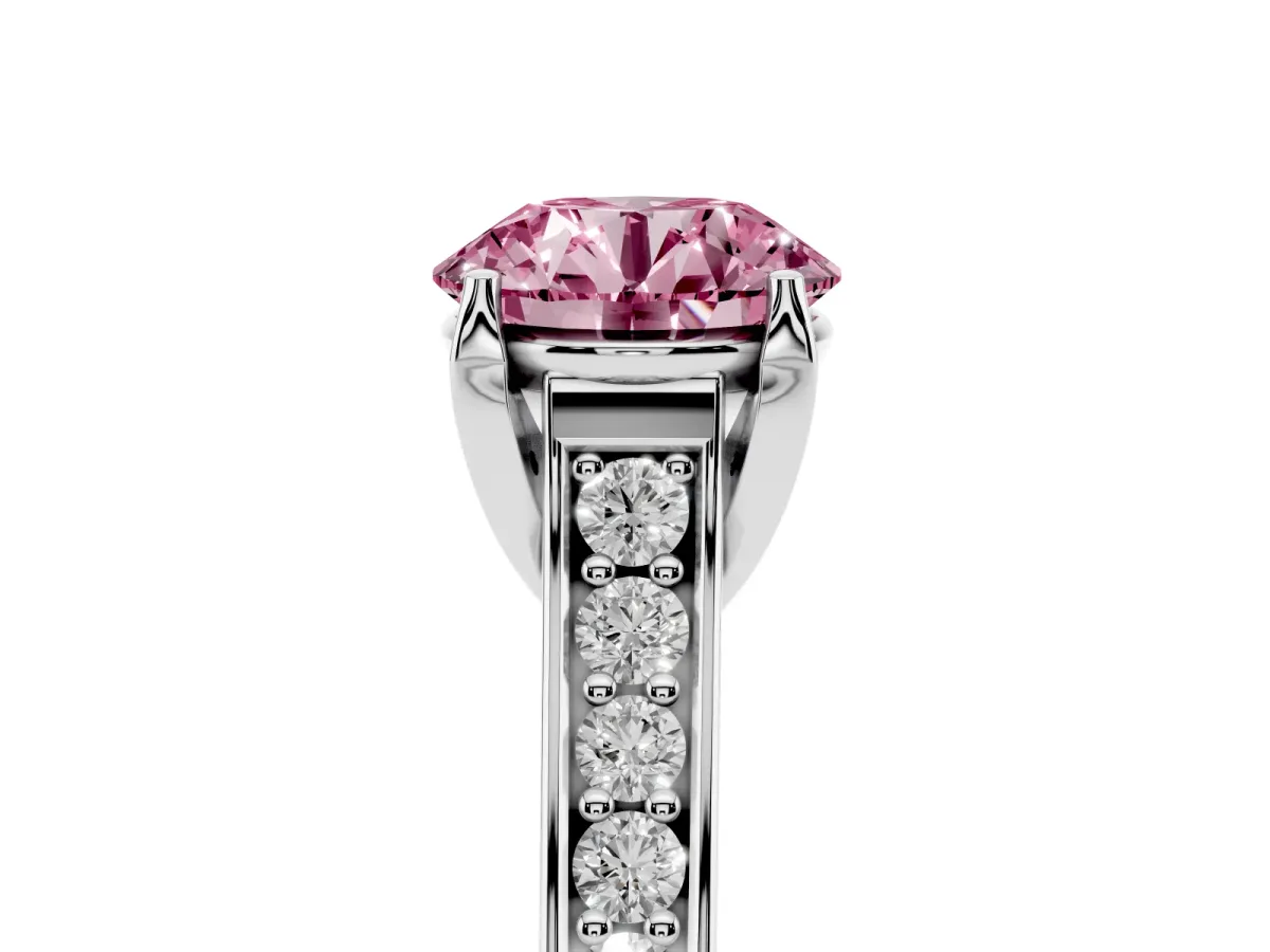 Fancy Pink Round Cut Brilliant Cut Diamond Engagement Ring with Pavé Band and Four-Prong Setting Silver