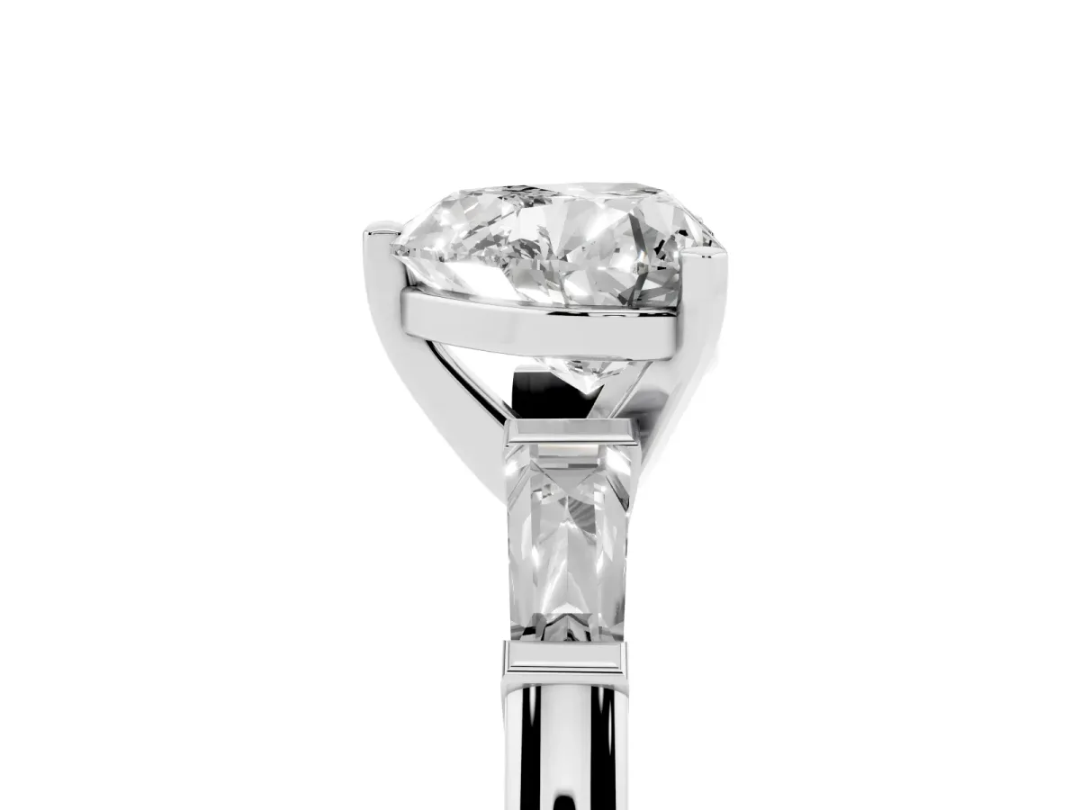 Heart Cut Solitaire with Tapered Baguette Side Stones on a Classic Band with Four-Prong Setting Silver