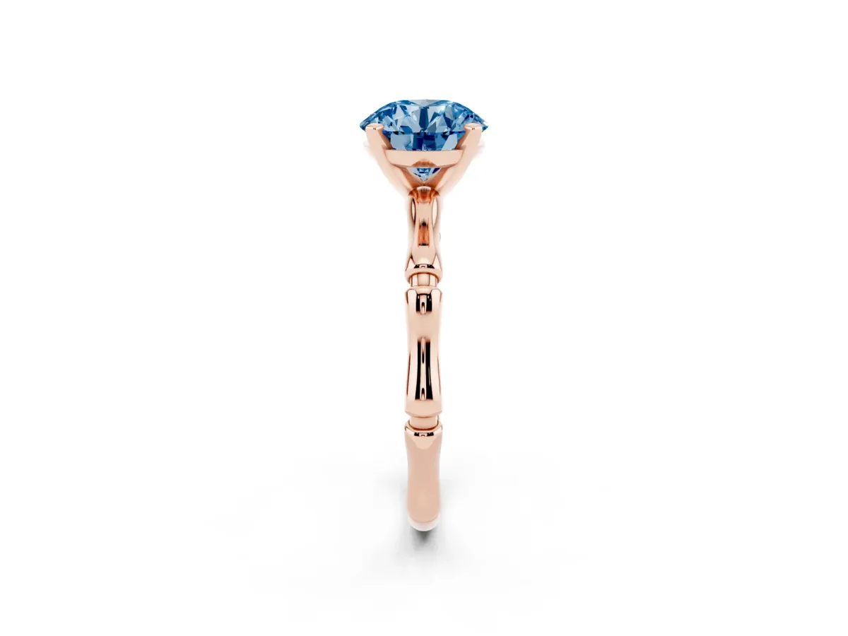 Fancy Blue Round Cut Solitaire Diamond Ring with Bamboo Band and Four-Prong Setting Rose gold