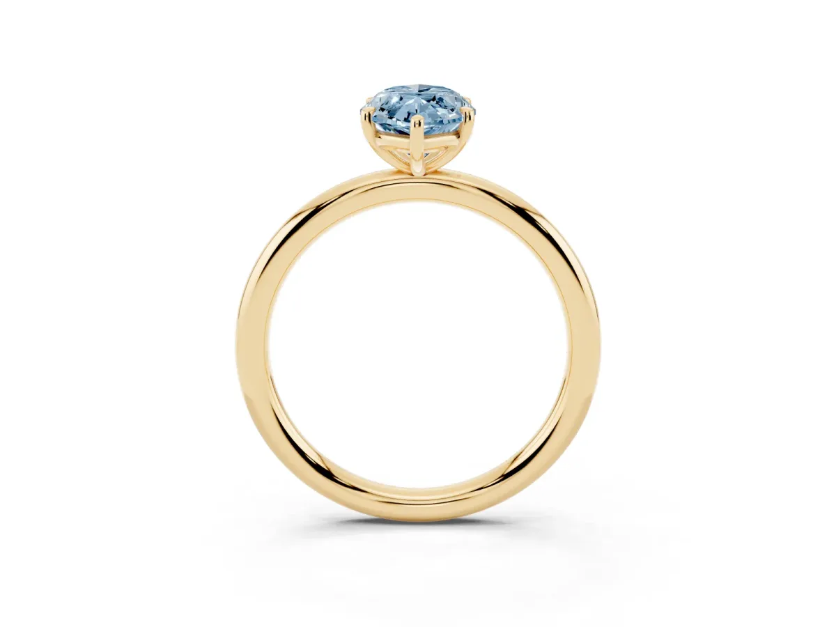 Fancy Blue Marquise Cut Solitaire Diamond Ring with Four-Prong Setting on a Plain Band Yellow gold