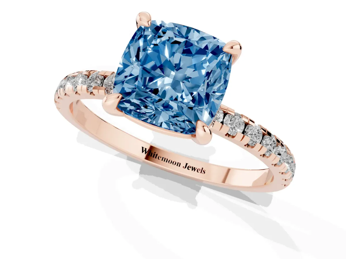 Fancy Blue Cushion Cut Diamond Brilliant Solitaire Ring with Pavé Band and Four-Prong Setting Rose gold