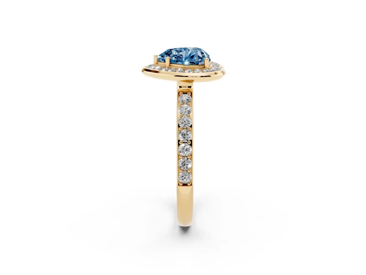 Fancy Blue Heart Cut Diamond Halo Ring with Bezel Frame and Pavé Band Yellow gold