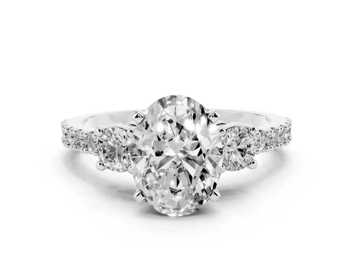 Oval Cut Three-Stone Diamond Pavé Band with Prong Setting Platinum