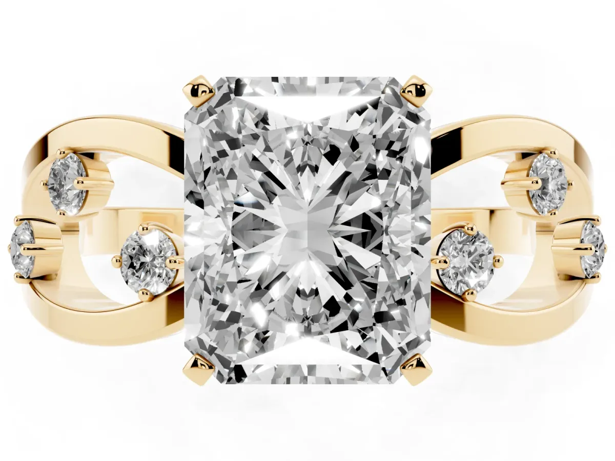 Radiant Cut Cut Solitaire Diamond with Side Stones on Criss-Cross Band and Four-Prong Setting Yellow gold