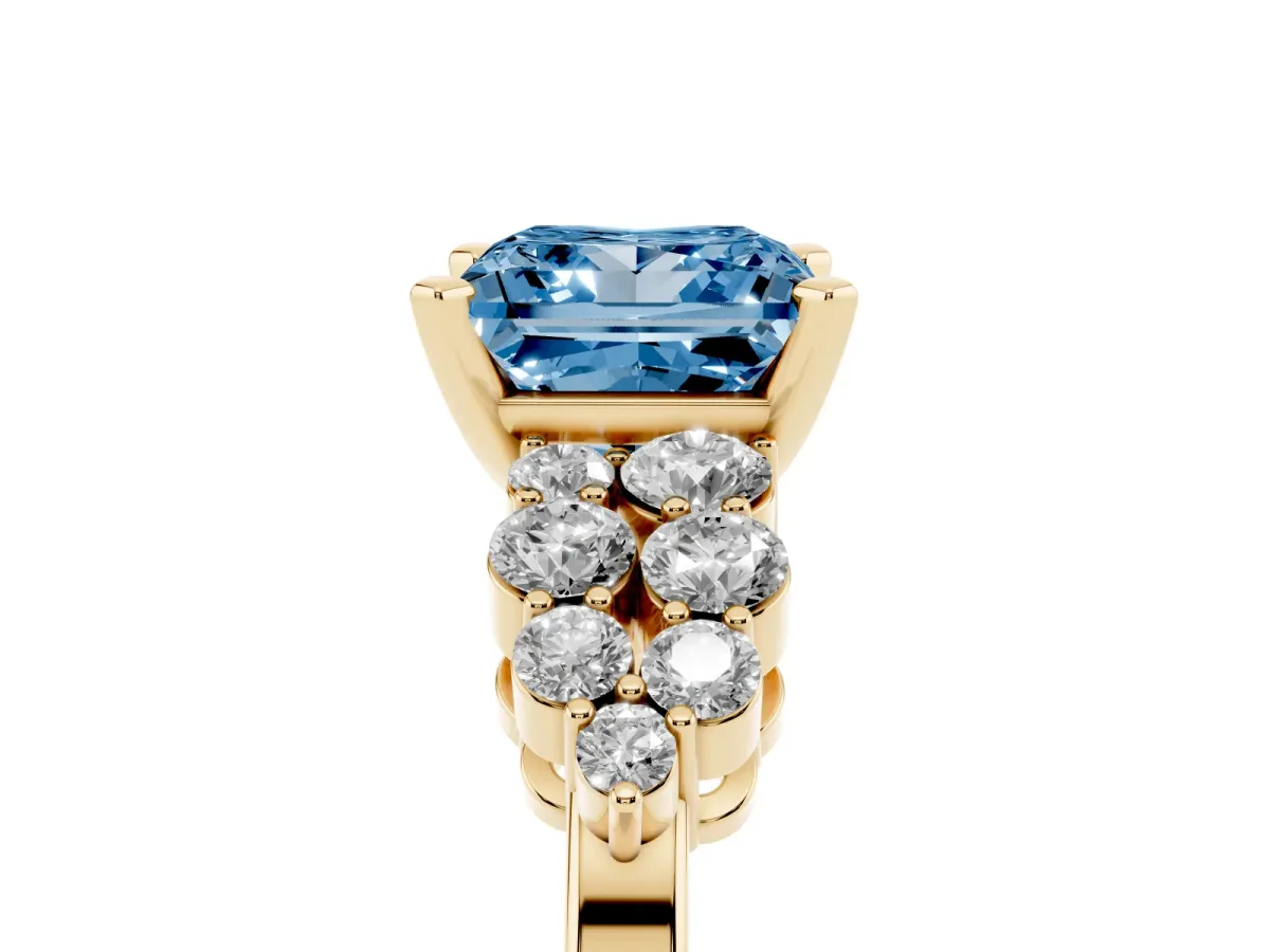 Fancy Blue Princess Cut Cluster Diamond Engagement Ring with Pavé Band and Four-Prong Setting Yellow gold