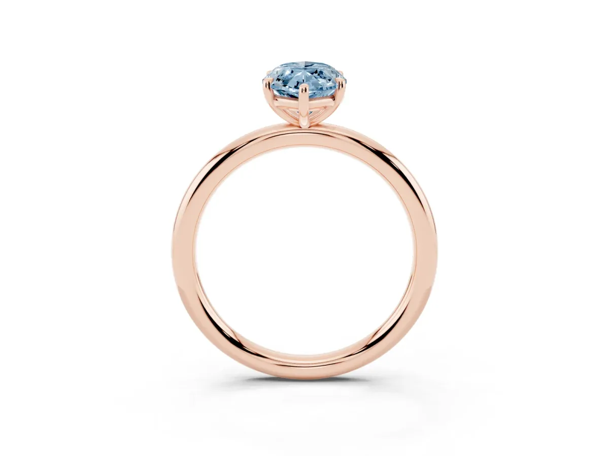 Fancy Blue Marquise Cut Solitaire Diamond Ring with Four-Prong Setting on a Plain Band Rose gold