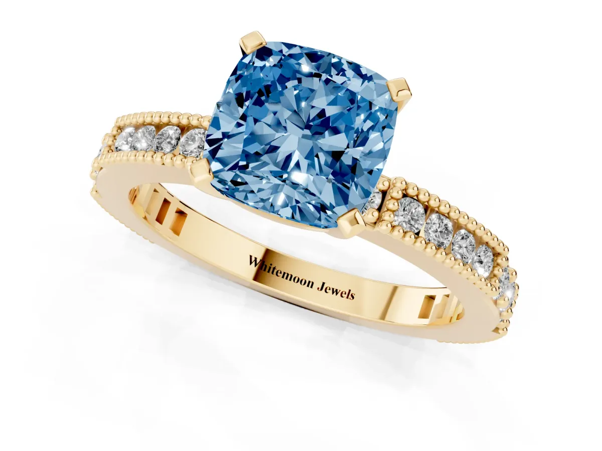 Fancy Blue Cushion Cut Solitaire with Pavé Band and Four-Prong Setting Yellow gold